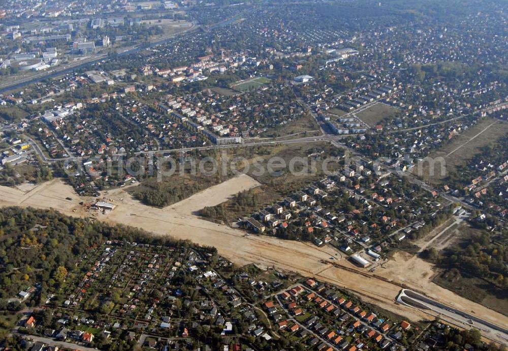 Aerial photograph Schönefeld - Blick auf die Verlängerung der Autobahn A 113 zwischen dem Stadtring und dem in Planung befindlichen Hauptstadt-Airport Berlin Brandenburg International BBI durch die Schälerbau Berlin GmbH an der Freiheit 10 in 13597 Berlin - Telefon +49 (0)30 35 187 03 - Fax +49 (0)30 35 187 398 - Mail info@schaelerbau.de ; Klähne & Bauchspieß - Beratende Ingenieure im Bauwesen GmbH, Inselstraße 6A, 10179 Berlin ; Ingenieurbüro Meyer + Schubart, Blumenauer Straße 10, 31515 Wunstorf