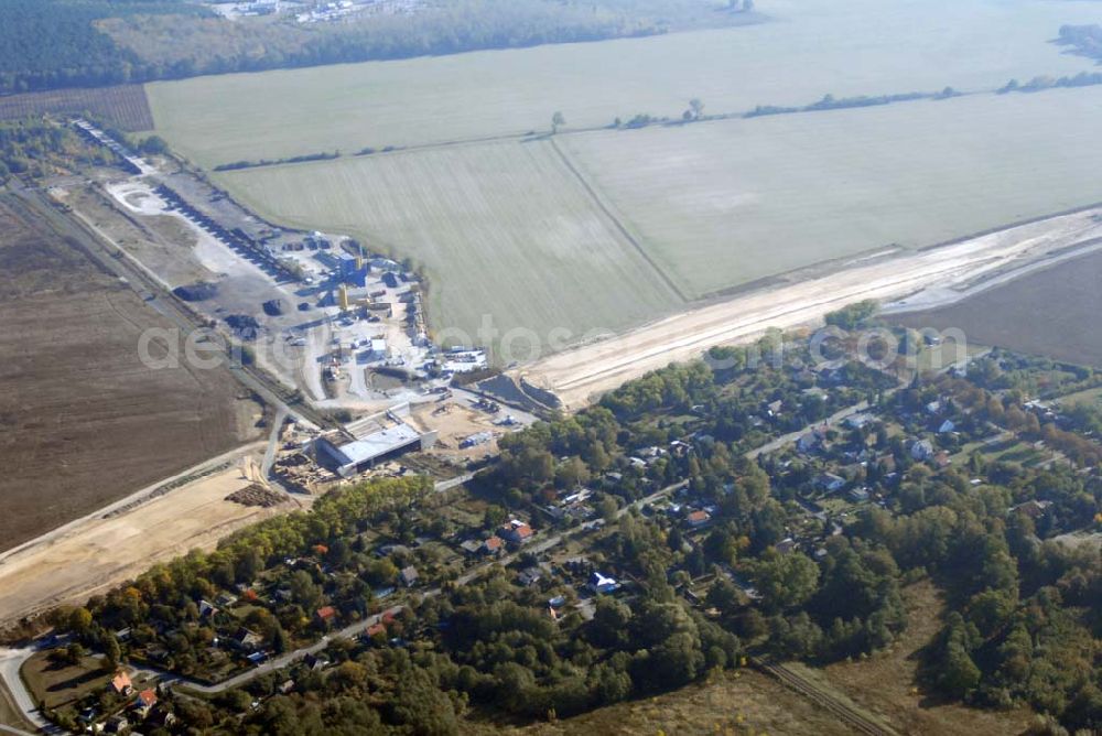 Aerial image Schönefeld - Blick auf die Verlängerung der Autobahn A 113 zwischen dem Stadtring und dem in Planung befindlichen Hauptstadt-Airport Berlin Brandenburg International BBI durch die Schälerbau Berlin GmbH an der Freiheit 10 in 13597 Berlin - Telefon +49 (0)30 35 187 03 - Fax +49 (0)30 35 187 398 - Mail info@schaelerbau.de ; Klähne & Bauchspieß - Beratende Ingenieure im Bauwesen GmbH, Inselstraße 6A, 10179 Berlin ; Ingenieurbüro Meyer + Schubart, Blumenauer Straße 10, 31515 Wunstorf