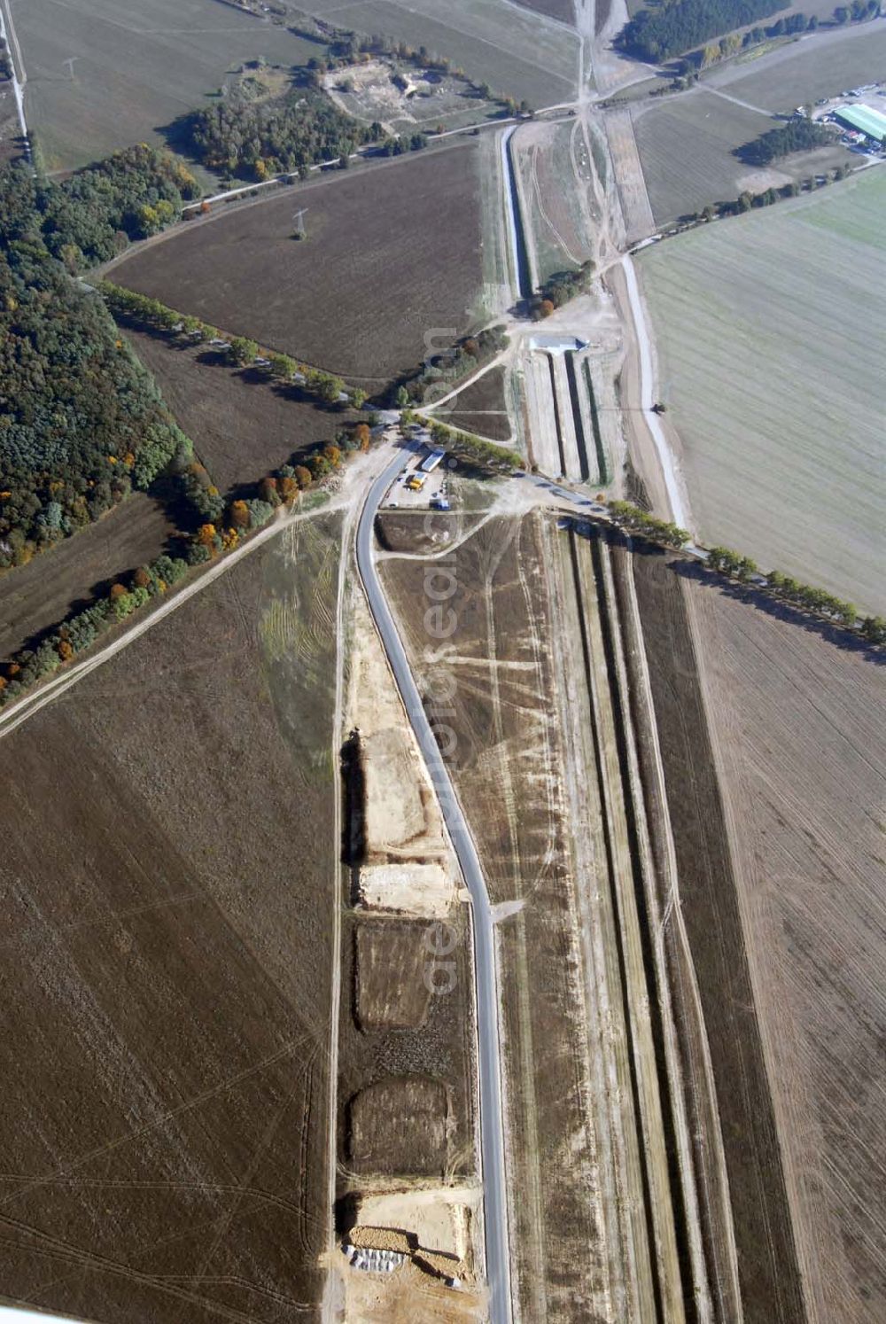 Schönefeld from the bird's eye view: Blick auf die Verlängerung der Autobahn A 113 zwischen dem Stadtring und dem in Planung befindlichen Hauptstadt-Airport Berlin Brandenburg International BBI durch die Schälerbau Berlin GmbH an der Freiheit 10 in 13597 Berlin - Telefon +49 (0)30 35 187 03 - Fax +49 (0)30 35 187 398 - Mail info@schaelerbau.de ; Klähne & Bauchspieß - Beratende Ingenieure im Bauwesen GmbH, Inselstraße 6A, 10179 Berlin ; Ingenieurbüro Meyer + Schubart, Blumenauer Straße 10, 31515 Wunstorf