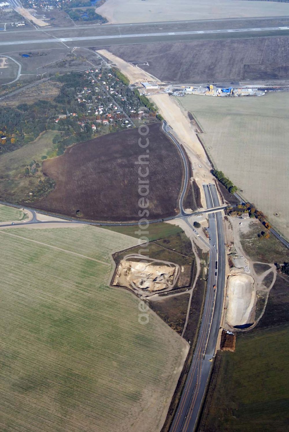 Schönefeld from the bird's eye view: Blick auf die Verlängerung der Autobahn A 113 zwischen dem Stadtring und dem in Planung befindlichen Hauptstadt-Airport Berlin Brandenburg International BBI durch die Schälerbau Berlin GmbH an der Freiheit 10 in 13597 Berlin - Telefon +49 (0)30 35 187 03 - Fax +49 (0)30 35 187 398 - Mail info@schaelerbau.de ; Klähne & Bauchspieß - Beratende Ingenieure im Bauwesen GmbH, Inselstraße 6A, 10179 Berlin ; Ingenieurbüro Meyer + Schubart, Blumenauer Straße 10, 31515 Wunstorf