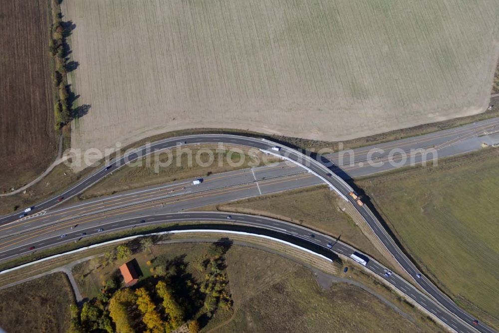 Aerial photograph Schönefeld - Blick auf die Verlängerung der Autobahn A 113 zwischen dem Stadtring und dem in Planung befindlichen Hauptstadt-Airport Berlin Brandenburg International BBI durch die Schälerbau Berlin GmbH an der Freiheit 10 in 13597 Berlin - Telefon +49 (0)30 35 187 03 - Fax +49 (0)30 35 187 398 - Mail info@schaelerbau.de ; Klähne & Bauchspieß - Beratende Ingenieure im Bauwesen GmbH, Inselstraße 6A, 10179 Berlin ; Ingenieurbüro Meyer + Schubart, Blumenauer Straße 10, 31515 Wunstorf