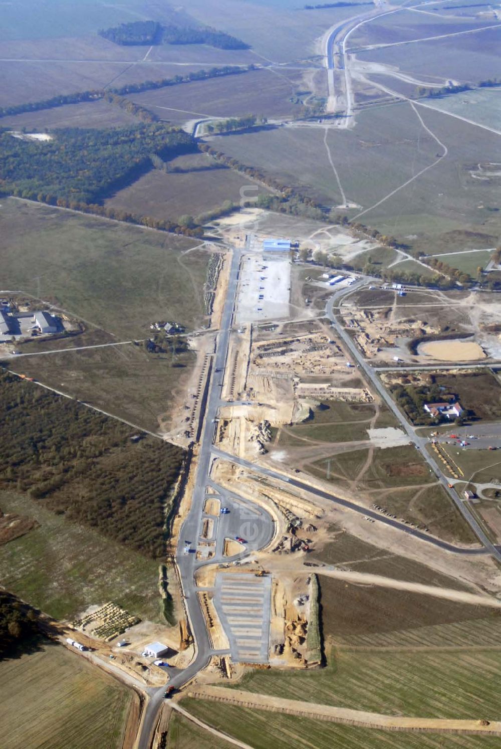 Aerial photograph Schönefeld - Blick auf die Verlängerung der Autobahn A 113 zwischen dem Stadtring und dem in Planung befindlichen Hauptstadt-Airport Berlin Brandenburg International BBI durch die Schälerbau Berlin GmbH an der Freiheit 10 in 13597 Berlin - Telefon +49 (0)30 35 187 03 - Fax +49 (0)30 35 187 398 - Mail info@schaelerbau.de ; Klähne & Bauchspieß - Beratende Ingenieure im Bauwesen GmbH, Inselstraße 6A, 10179 Berlin ; Ingenieurbüro Meyer + Schubart, Blumenauer Straße 10, 31515 Wunstorf