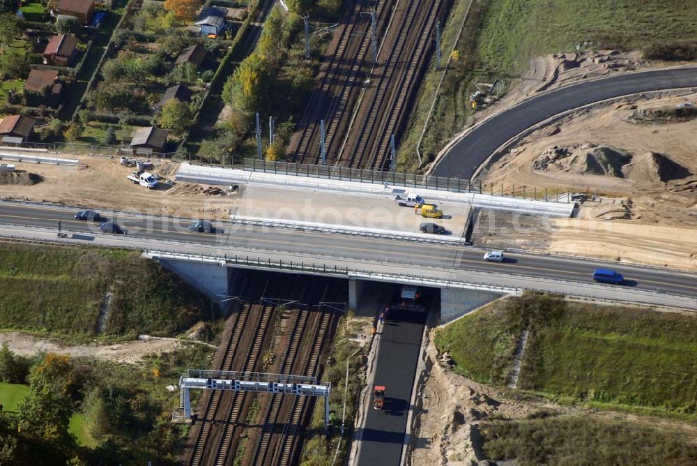 Schönefeld from the bird's eye view: Blick auf die Verlängerung der Autobahn A 113 zwischen dem Stadtring und dem in Planung befindlichen Hauptstadt-Airport Berlin Brandenburg International BBI durch die Schälerbau Berlin GmbH an der Freiheit 10 in 13597 Berlin - Telefon +49 (0)30 35 187 03 - Fax +49 (0)30 35 187 398 - Mail info@schaelerbau.de ; Klähne & Bauchspieß - Beratende Ingenieure im Bauwesen GmbH, Inselstraße 6A, 10179 Berlin ; Ingenieurbüro Meyer + Schubart, Blumenauer Straße 10, 31515 Wunstorf