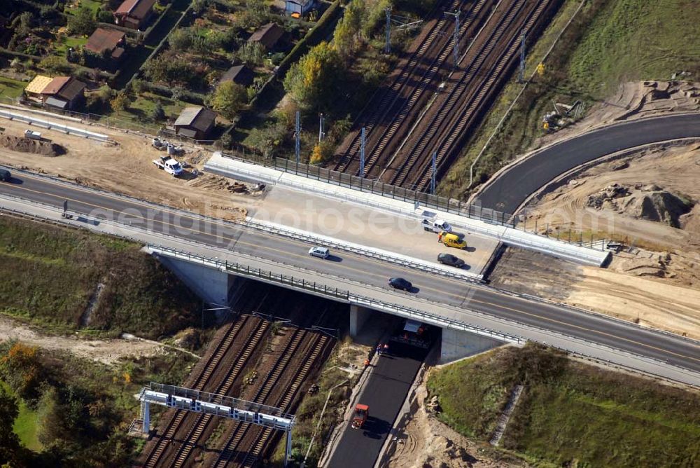 Aerial image Schönefeld - Blick auf die Verlängerung der Autobahn A 113 zwischen dem Stadtring und dem in Planung befindlichen Hauptstadt-Airport Berlin Brandenburg International BBI durch die Schälerbau Berlin GmbH an der Freiheit 10 in 13597 Berlin - Telefon +49 (0)30 35 187 03 - Fax +49 (0)30 35 187 398 - Mail info@schaelerbau.de ; Klähne & Bauchspieß - Beratende Ingenieure im Bauwesen GmbH, Inselstraße 6A, 10179 Berlin ; Ingenieurbüro Meyer + Schubart, Blumenauer Straße 10, 31515 Wunstorf