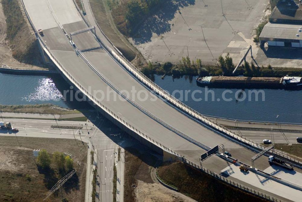 Aerial image Schönefeld - Blick auf die Verlängerung der Autobahn A 113 zwischen dem Stadtring und dem in Planung befindlichen Hauptstadt-Airport Berlin Brandenburg International BBI durch die Schälerbau Berlin GmbH an der Freiheit 10 in 13597 Berlin - Telefon +49 (0)30 35 187 03 - Fax +49 (0)30 35 187 398 - Mail info@schaelerbau.de ; Klähne & Bauchspieß - Beratende Ingenieure im Bauwesen GmbH, Inselstraße 6A, 10179 Berlin ; Ingenieurbüro Meyer + Schubart, Blumenauer Straße 10, 31515 Wunstorf