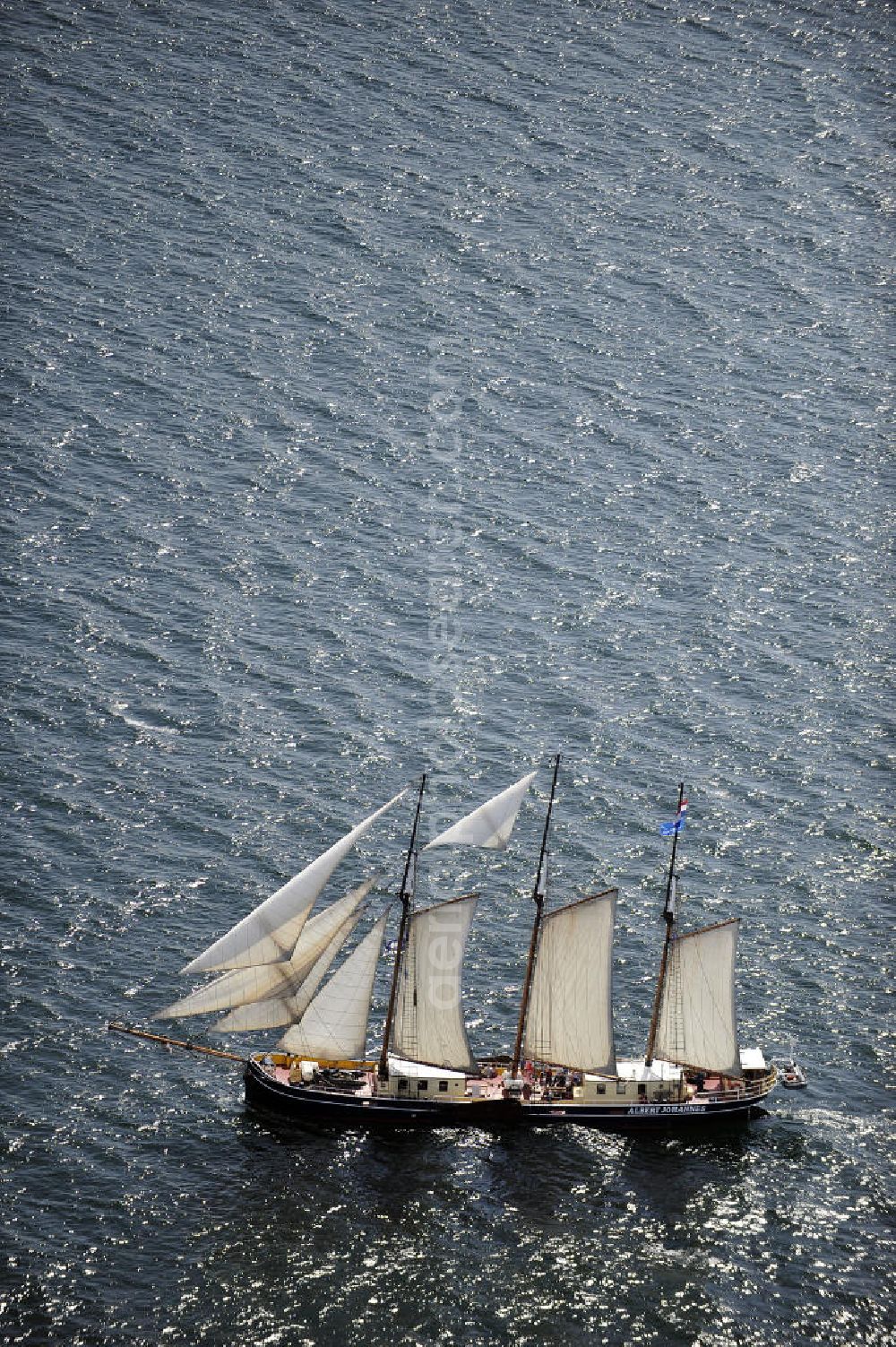 Insel Poel from the bird's eye view: Blick auf den Großsegler Albert Johannes , einem äußerst solide gebauten, zuverlässigen Segelschiff, welches im Jahr 1928 als Frachtsegler auf Kiel gelegt wurde. Wegen seines geringen Tiefganges von nur 1,5 Metern eignet sich das Schiff hervorragend für Erkundungstouren auf den Gewässern der dänischen, deutschen und schwedischen Ostseeküste. View of the tall ship Albert John, an extremely well-built, reliable sailboat, which was laid in 1928 as a cargo sailing on keel.