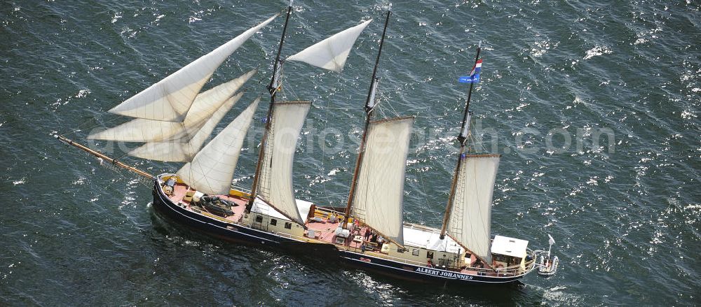 Insel Poel from the bird's eye view: Blick auf den Großsegler Albert Johannes , einem äußerst solide gebauten, zuverlässigen Segelschiff, welches im Jahr 1928 als Frachtsegler auf Kiel gelegt wurde. Wegen seines geringen Tiefganges von nur 1,5 Metern eignet sich das Schiff hervorragend für Erkundungstouren auf den Gewässern der dänischen, deutschen und schwedischen Ostseeküste. View of the tall ship Albert John, an extremely well-built, reliable sailboat, which was laid in 1928 as a cargo sailing on keel.