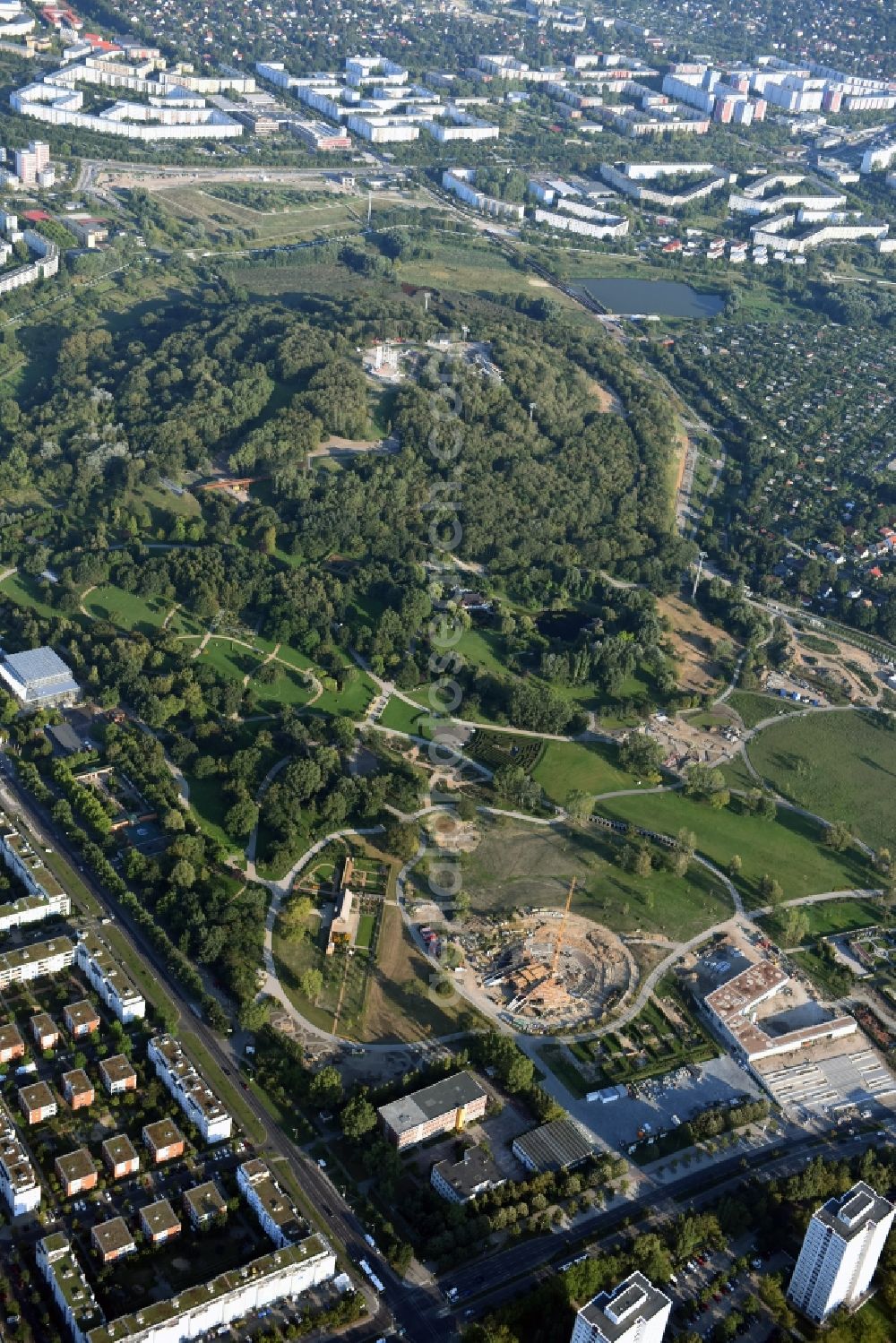 Berlin from the bird's eye view: Gaerten der Welt park on the premises of the IGA 2017 in the district of Marzahn-Hellersdorf in Berlin. Residential buildings and estates are located in the background along Eisenacher Strasse