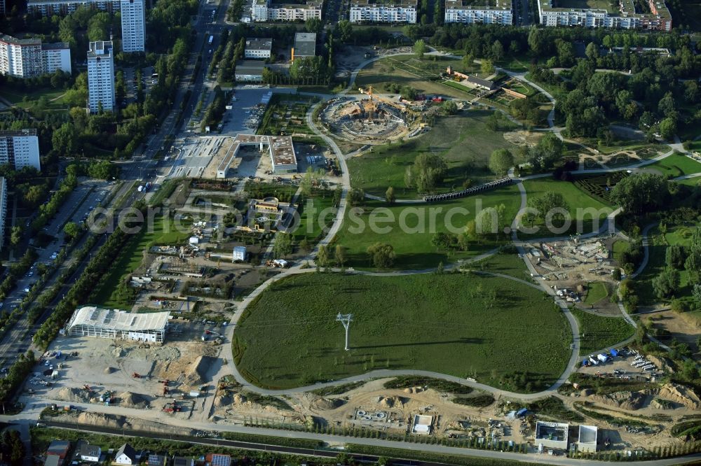 Aerial image Berlin - Gaerten der Welt park on the premises of the IGA 2017 in the district of Marzahn-Hellersdorf in Berlin. Residential buildings and estates are located in the background along Eisenacher Strasse