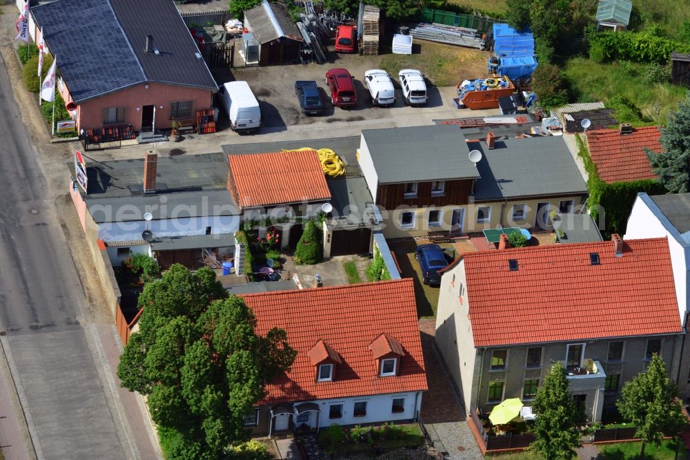 Werneuchen from above - The estate of the roofing contractor My Dach-Direct next to two residences at the Muehlenstrasse in Werneuchen in the state Brandenburg