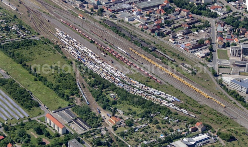 Aerial photograph Nordhausen - The goods station of Nordhausen in Thuringia is an important transportation hub. On the tracks, many cars are many with tanks, timber and bulk