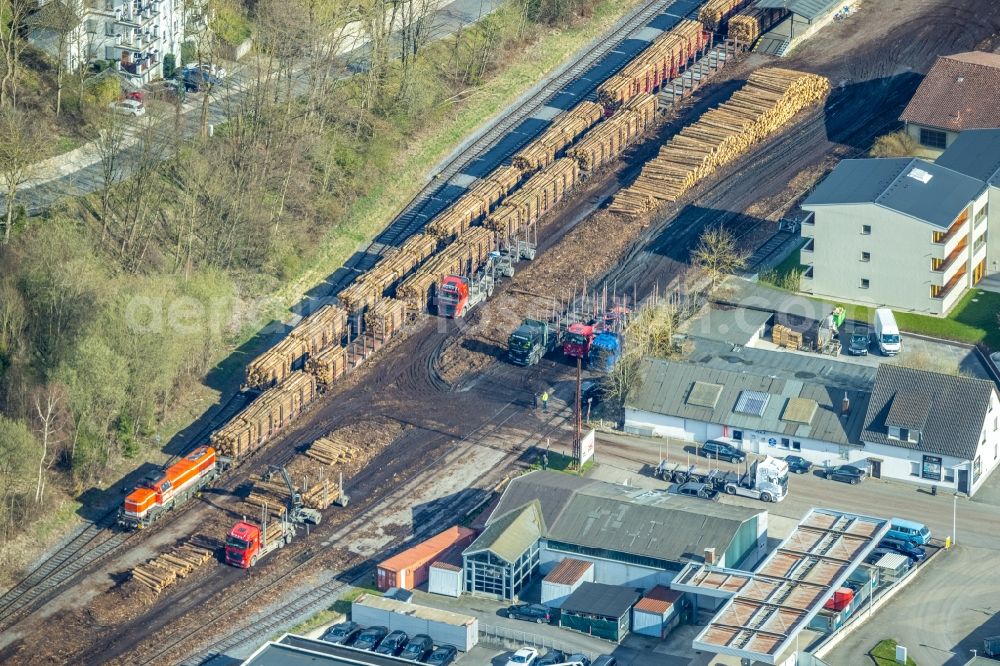 Aerial image Sundern - Loading of wagons fuer einen Holztransport of a train in freight traffic on the track in Sundern (Sauerland) at Sauerland in the state North Rhine-Westphalia, Germany