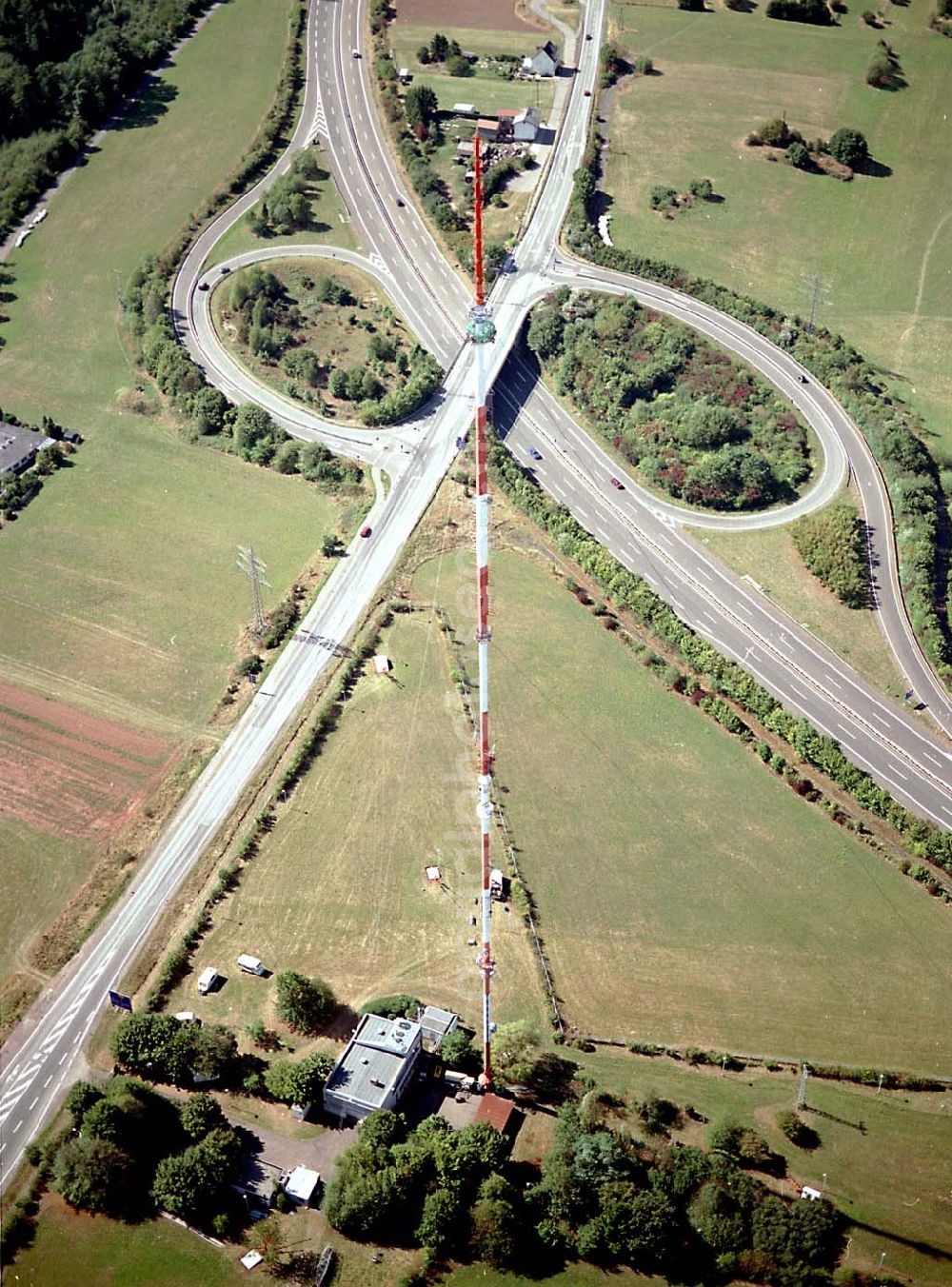 Aerial photograph Göttelborn / Saarland - Göttelborn / Saarland Blick auf die Sanierung des Sendemastes im Saarland durch die Firma W. Diener aus Köln an der Autobahnauffahrt A1 03.09.2003