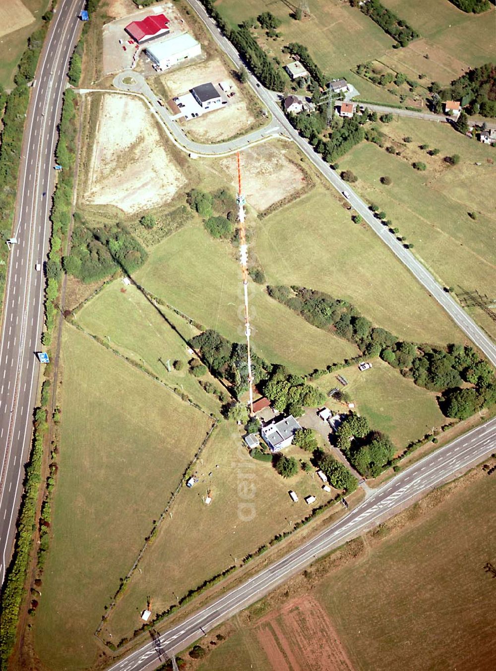 Göttelborn / Saarland from the bird's eye view: Göttelborn / Saarland Blick auf die Sanierung des Sendemastes im Saarland durch die Firma W. Diener aus Köln an der Autobahnauffahrt A1 03.09.2003