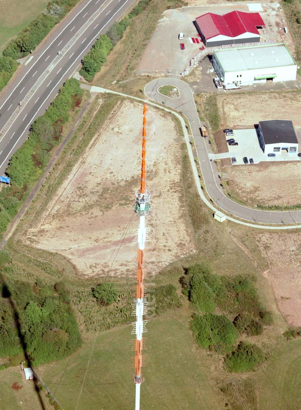 Aerial photograph Göttelborn / Saarland - Göttelborn / Saarland Blick auf die Sanierung des Sendemastes im Saarland durch die Firma W. Diener aus Köln an der Autobahnauffahrt A1 03.09.2003