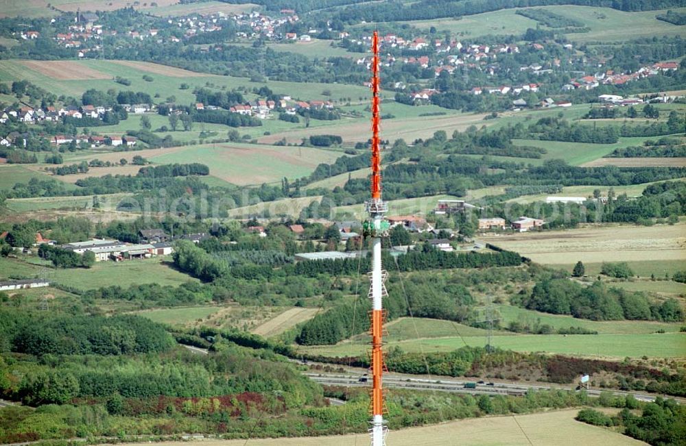 Aerial photograph Göttelborn / Saarland - Göttelborn / Saarland Blick auf die Sanierung des Sendemastes im Saarland durch die Firma W. Diener aus Köln an der Autobahnauffahrt A1; (teilweise mit Sicht auf Göttelborn) 03.09.2003