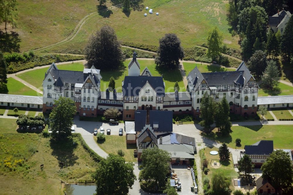 Müllrose from above - Zeisigberg estate in Muellrose in the state of Brandenburg. The historic building complex was opened as a sanatorium for consumptives in 1907 and is being run by the development office for health and social issues as a care home, children`s facility and home for the elderly