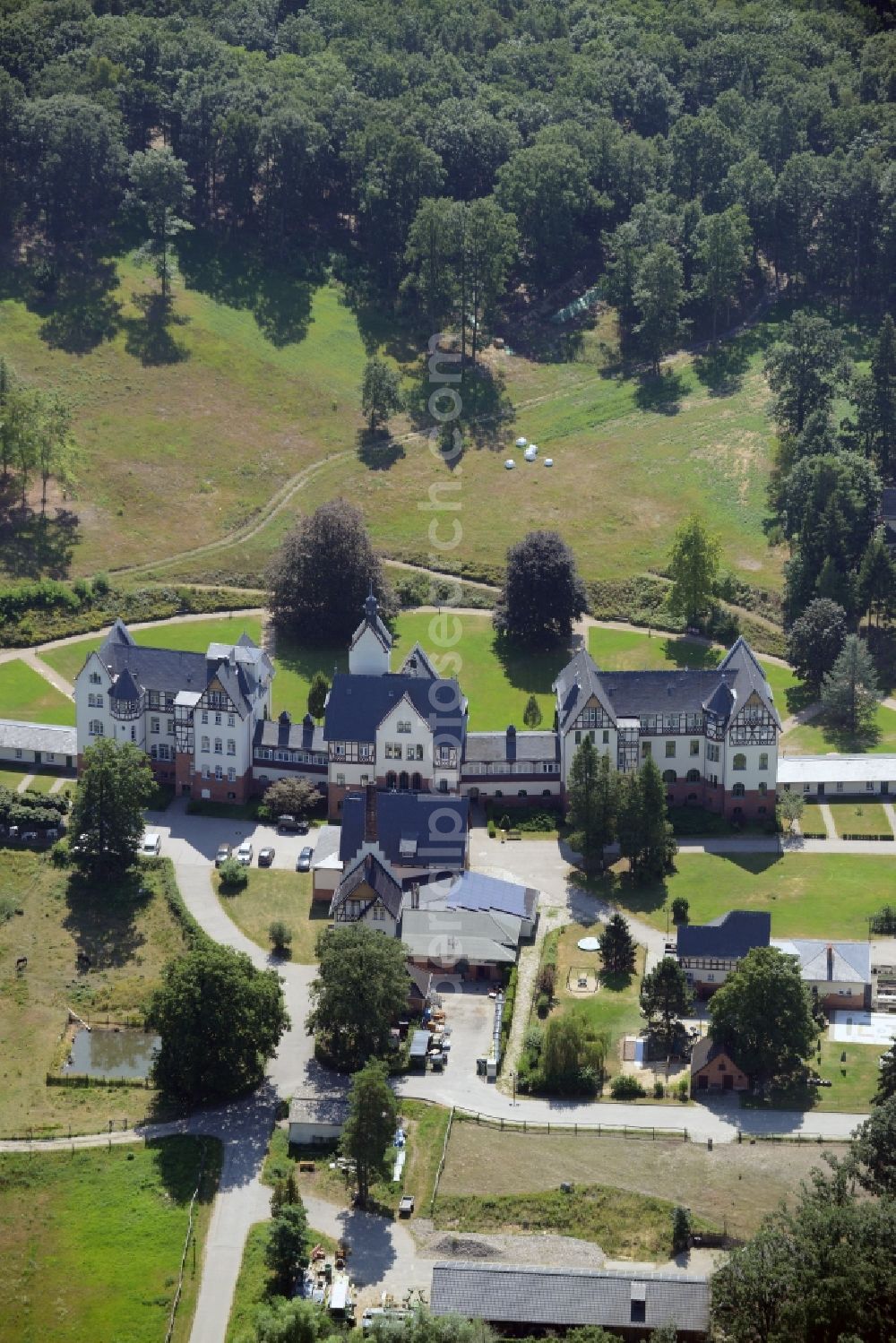 Müllrose from the bird's eye view: Zeisigberg estate in Muellrose in the state of Brandenburg. The historic building complex was opened as a sanatorium for consumptives in 1907 and is being run by the development office for health and social issues as a care home, children`s facility and home for the elderly