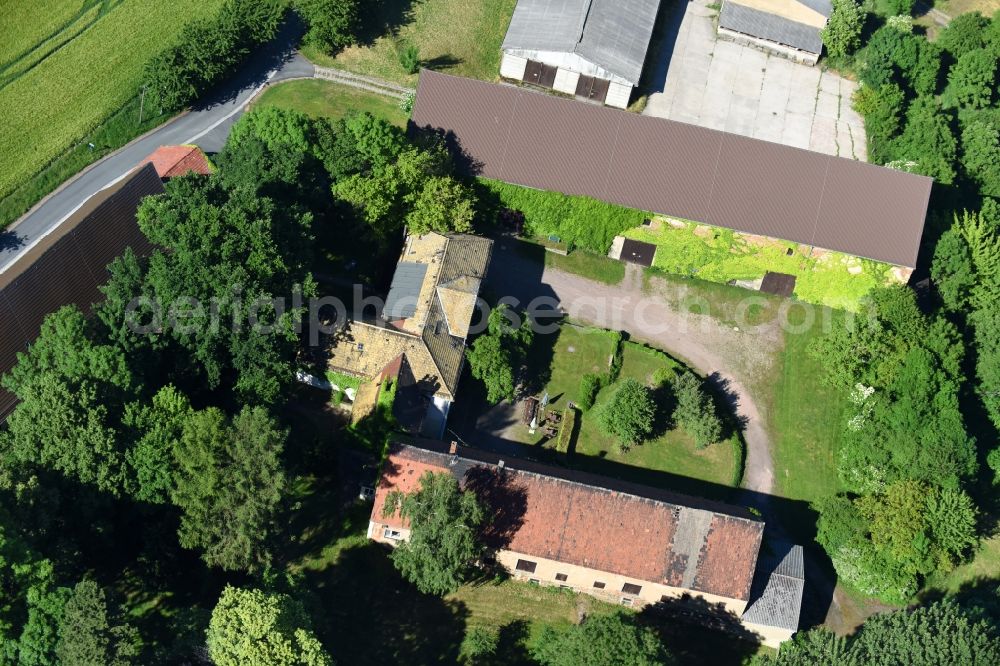 Gödelitz from the bird's eye view: Building and manor house of the farmhouse in Goedelitz in the state Saxony, Germany