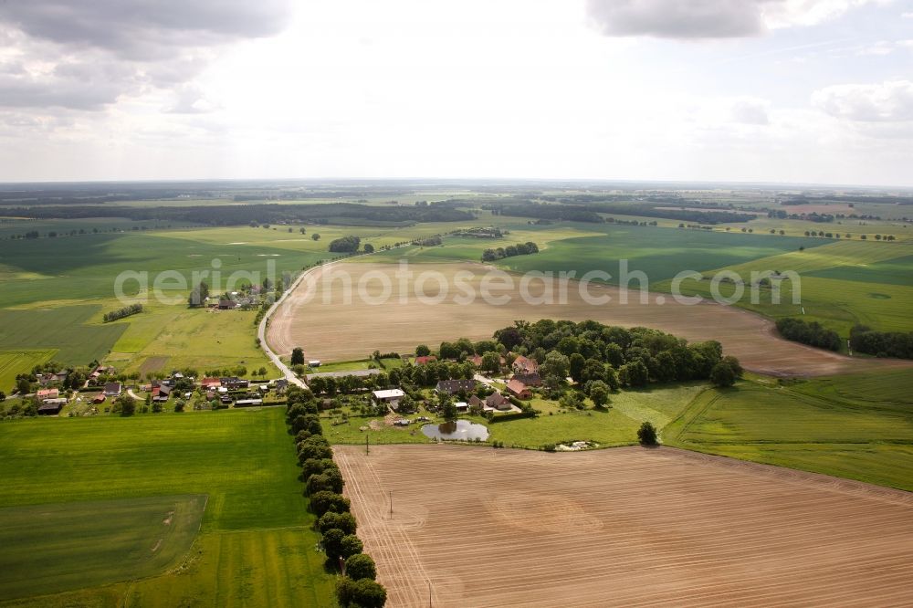 Vipperow from the bird's eye view: Building complex of the manor house Solzow surrounded by green fields next to the park Gutshaus Solzow in the Lange Strasse in Vipperow in Mecklenburg-Western Pomerania