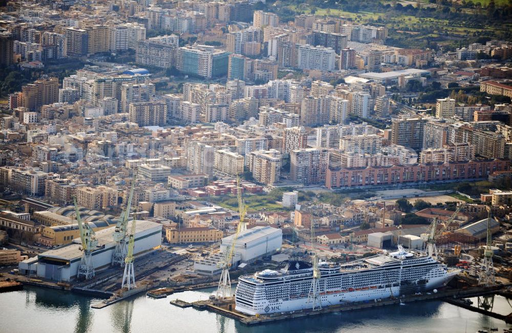 Aerial image Palermo Sizilien - Fincantierii yard with the cruise ship MSC Splendida, of the Italian shipping company MSC Crociers S.A. for the overhaul at the dry dock of the shipyard in Palermo, Sicily, Italy