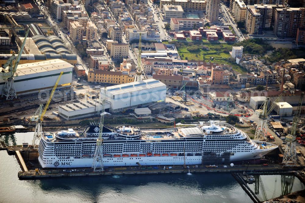 Palermo Sizilien from the bird's eye view: Fincantierii yard with the cruise ship MSC Splendida, of the Italian shipping company MSC Crociers S.A. for the overhaul at the dry dock of the shipyard in Palermo, Sicily, Italy