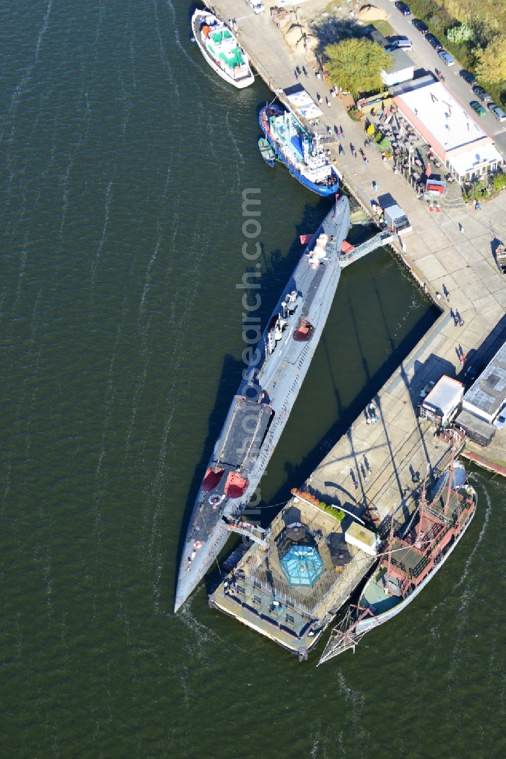 Aerial image Peenemünde - Overlooking the historic harbor Peenemünde with the Russian submarine U-461