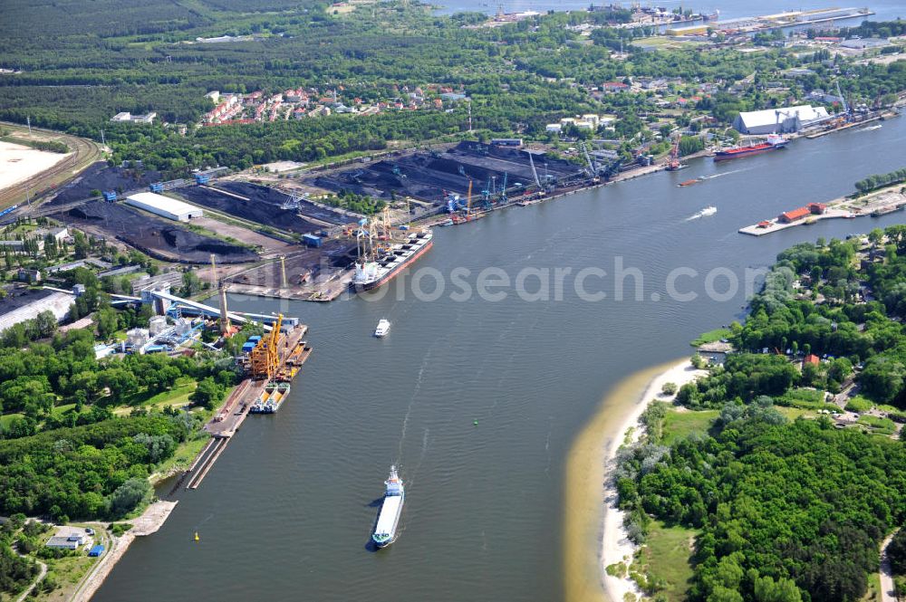 Aerial photograph SWINEMÜNDE - SWINOUJSCIE 02.06.2011 Harbor of the Port Port Handlowy Swinoujscie Ltd. in Swinoujscie, Poland. The harbor is the youngest one at the water mouth of the Swine river which is flowing into the Baltic Sea and is the largest center for the handling of bulk cargo ships at the polish coast