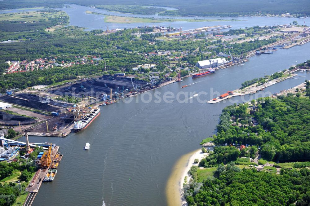 SWINEMÜNDE from above - SWINOUJSCIE 02.06.2011 Harbor of the Port Port Handlowy Swinoujscie Ltd. in Swinoujscie, Poland. The harbor is the youngest one at the water mouth of the Swine river which is flowing into the Baltic Sea and is the largest center for the handling of bulk cargo ships at the polish coast