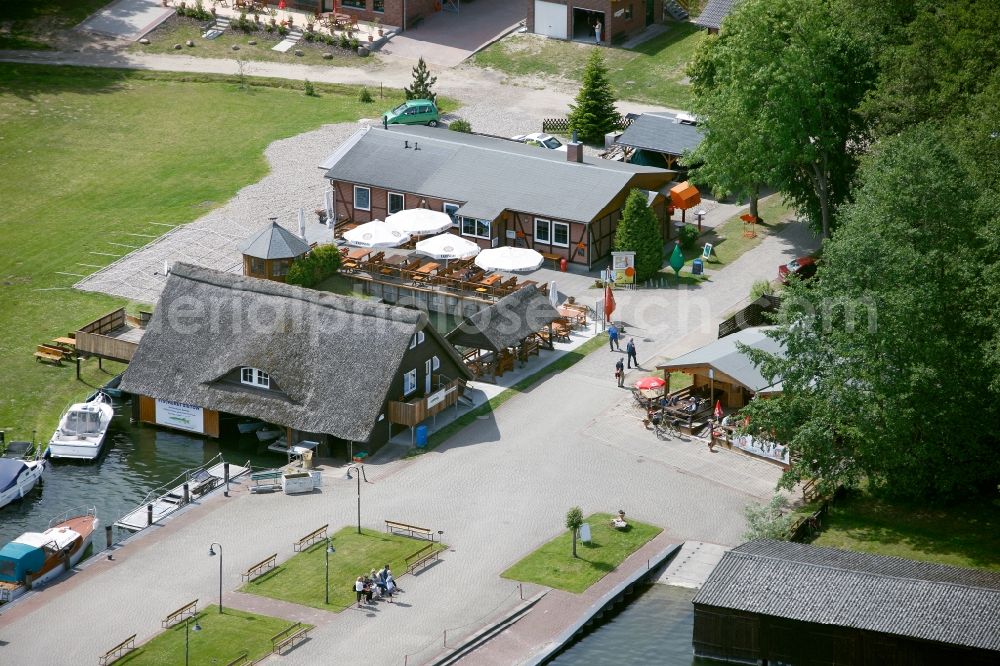 Sietow from the bird's eye view: Overview the harbor buildings in Sietow (village) in the state of Mecklenburg-Vorpommern. The annually harbor festival is a solid tradition in the village