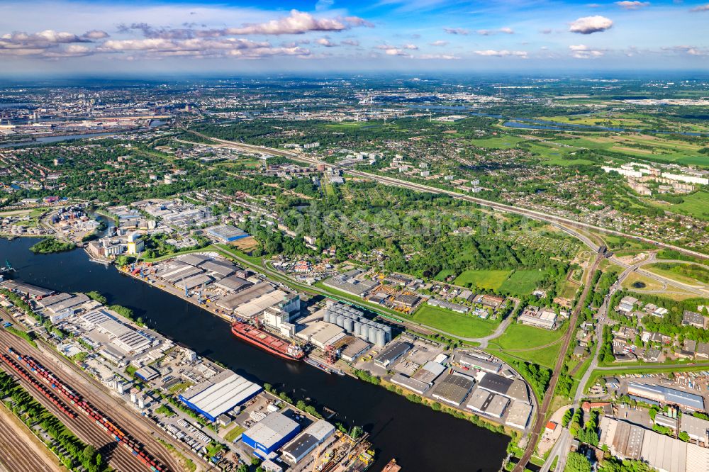 Hamburg from the bird's eye view: Harbor loading station for solid and bulk goods from HABEMEA Futtermittel Gmbh in the harbor area in Wilhelmsburg in Hamburg, Germany