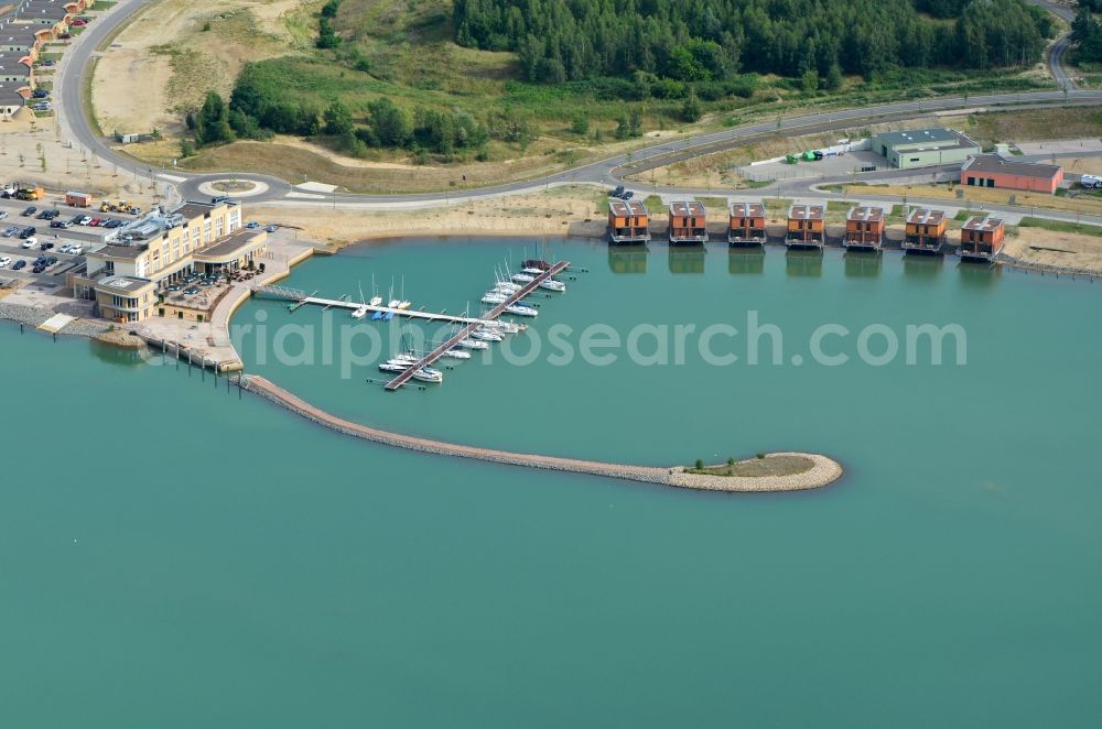 Großpösna from the bird's eye view: Port facility at the resort Lagovida on the Magdeborner peninsula in the reclamation area Neuseenland Stoermthaler lake at Großpoesna in Saxony