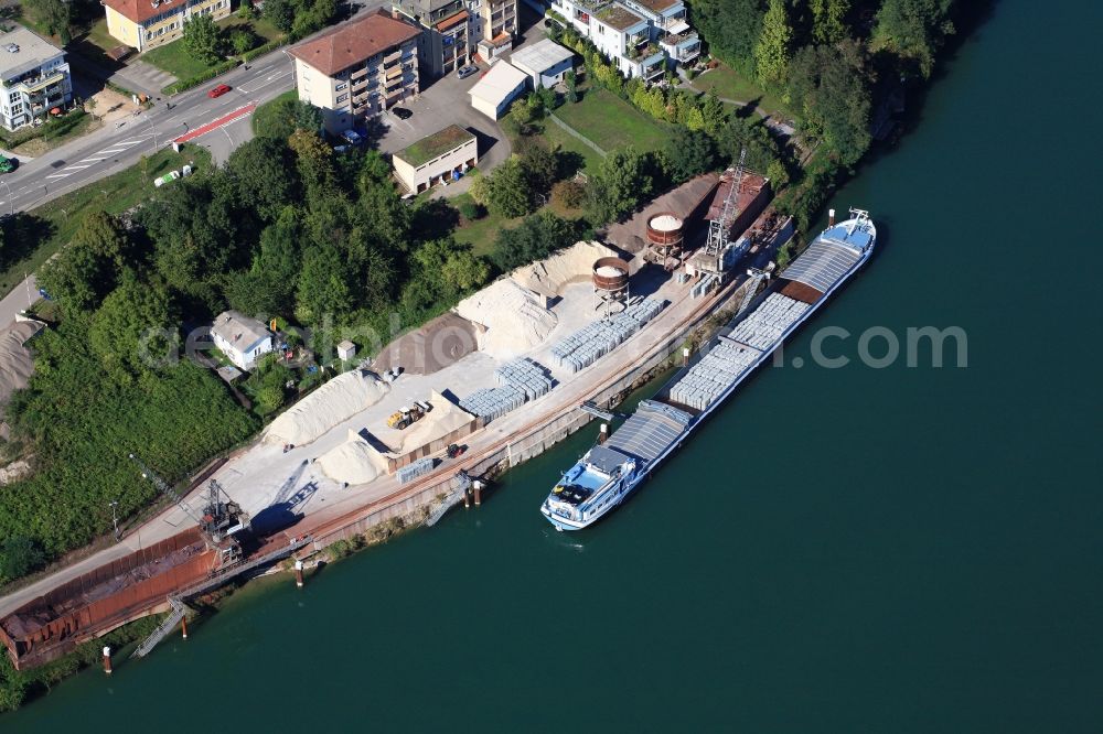 Aerial image Rheinfelden (Baden) - Port facilities on the Rhine in Rheinfelden ( Baden ) in the state of Baden-Wuerttemberg. The cargo ship transports the raw material aluminum 