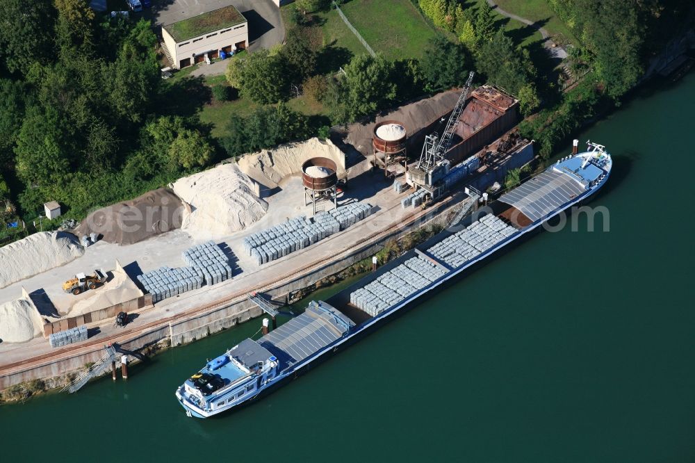 Aerial photograph Rheinfelden (Baden) - Port facilities on the Rhine in Rheinfelden ( Baden ) in the state of Baden-Wuerttemberg. The cargo ship transports the raw material aluminum 