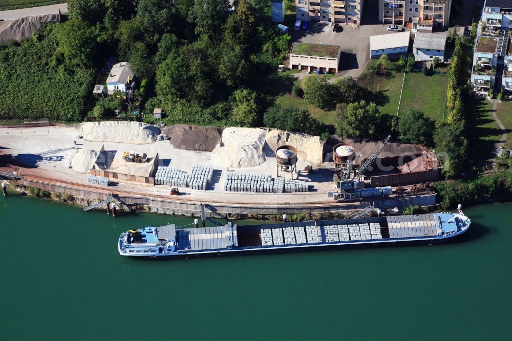 Rheinfelden (Baden) from above - Port facilities on the Rhine in Rheinfelden ( Baden ) in the state of Baden-Wuerttemberg. The cargo ship transports the raw material aluminum 