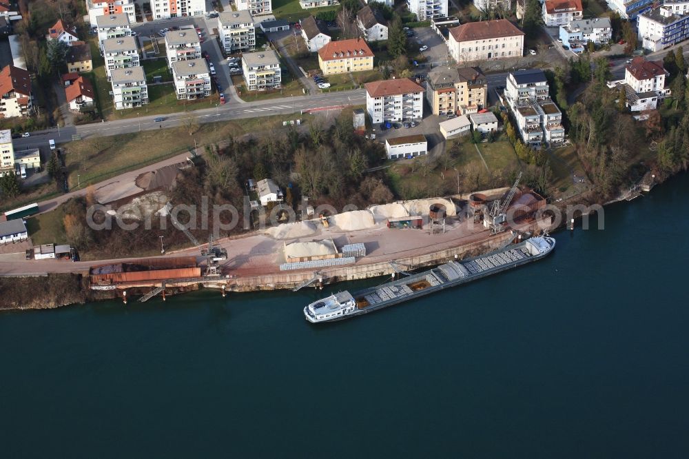 Aerial photograph Rheinfelden (Baden) - Port facilities on the Rhine in Rheinfelden ( Baden ) in the state of Baden-Wuerttemberg. The cargo ship transports the raw material aluminum. It is the last harbour for ships comming from the North Sea