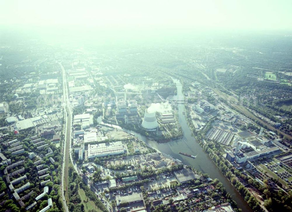 Berlin - Spandau from the bird's eye view: Hafenanlagen der BEHALA an der Nonnendammallee in Berlin - Spandau am Heizkraftwerk Reuter - West.