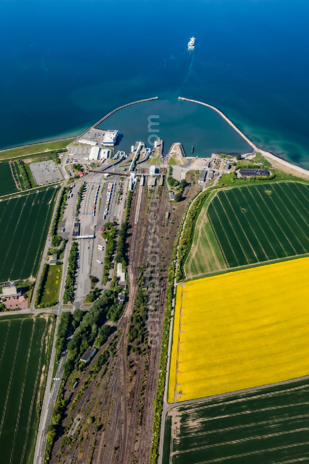 Fehmarn from the bird's eye view: Port facilities with ferry port and terminal and train station in Puttgarden on Fehmarn in the state Schleswig-Holstein, Germany