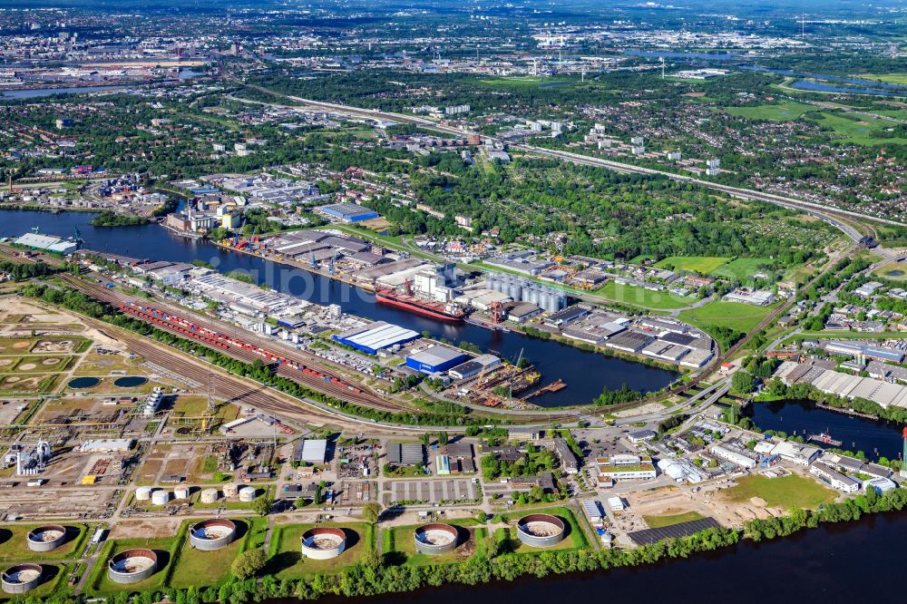 Hamburg from the bird's eye view: Port facilities and commercial area with rail and track lines on the sidings and shunting routes of the marshalling yard and freight yard Hohe Schaar on Eversween Street in Hamburg Wilhelmsburg, Germany