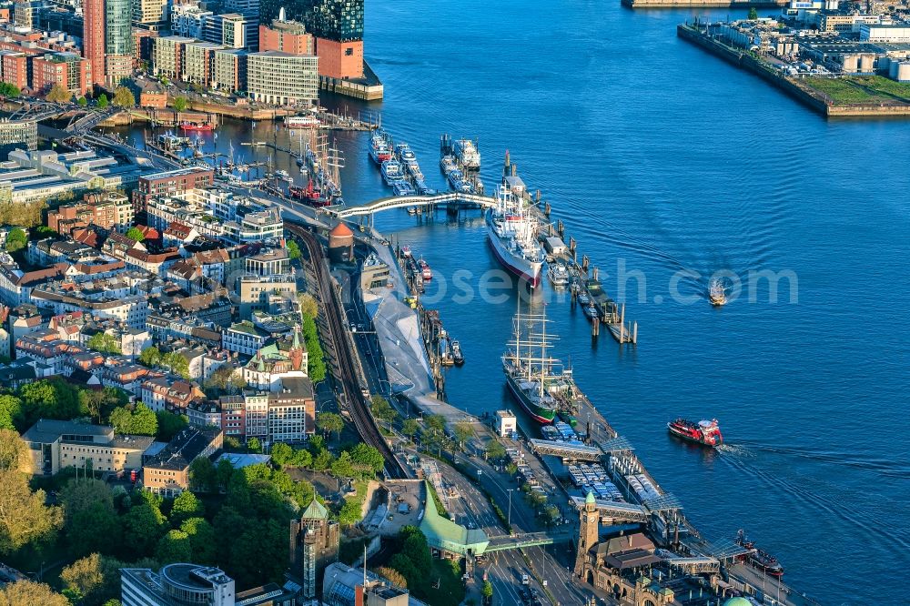 Hamburg from the bird's eye view: Port facilities and jetties sunset in St.Pauli on the banks of the river course of the of the River Elbe in Hamburg, Germany