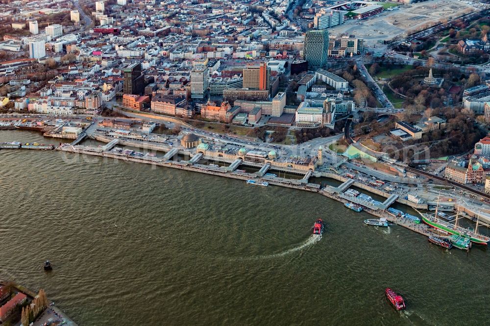 Hamburg from the bird's eye view: Port facilities and jetties sunset in St.Pauli on the banks of the river course of the of the River Elbe in Hamburg, Germany