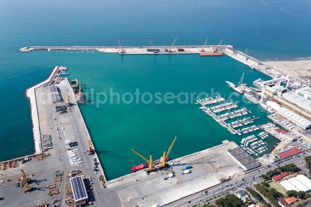 Carrara from above - Port facilities on the seashore of the Ligurian sea in the district Marina di Carrara in Carrara in Toskana, Italy