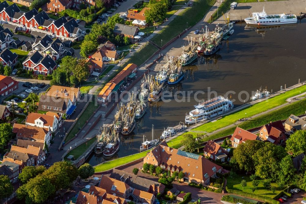 Aerial photograph Greetsiel - Port facilities on the seashore of the North Sea in Greetsiel in the state Lower Saxony, Germany