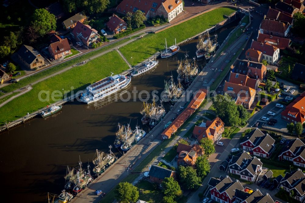 Aerial image Greetsiel - Port facilities on the seashore of the North Sea in Greetsiel in the state Lower Saxony, Germany