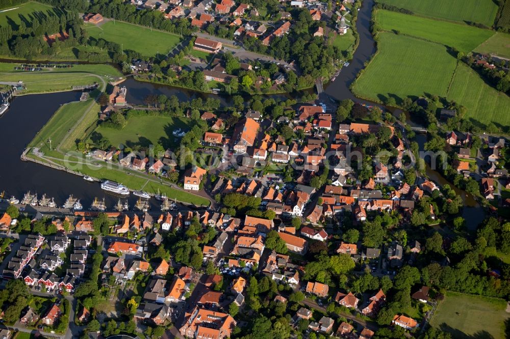 Greetsiel from the bird's eye view: Port facilities on the seashore of the North Sea in Greetsiel in the state Lower Saxony, Germany