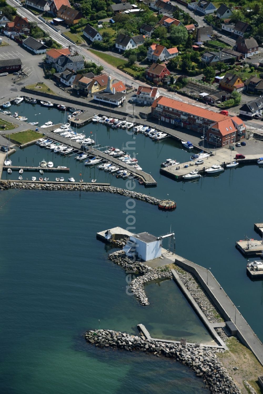 Allinge from above - Port facilities on the seashore of the Baltic Sea on Bornholm Island in Allinge in Region Hovedstaden, Denmark