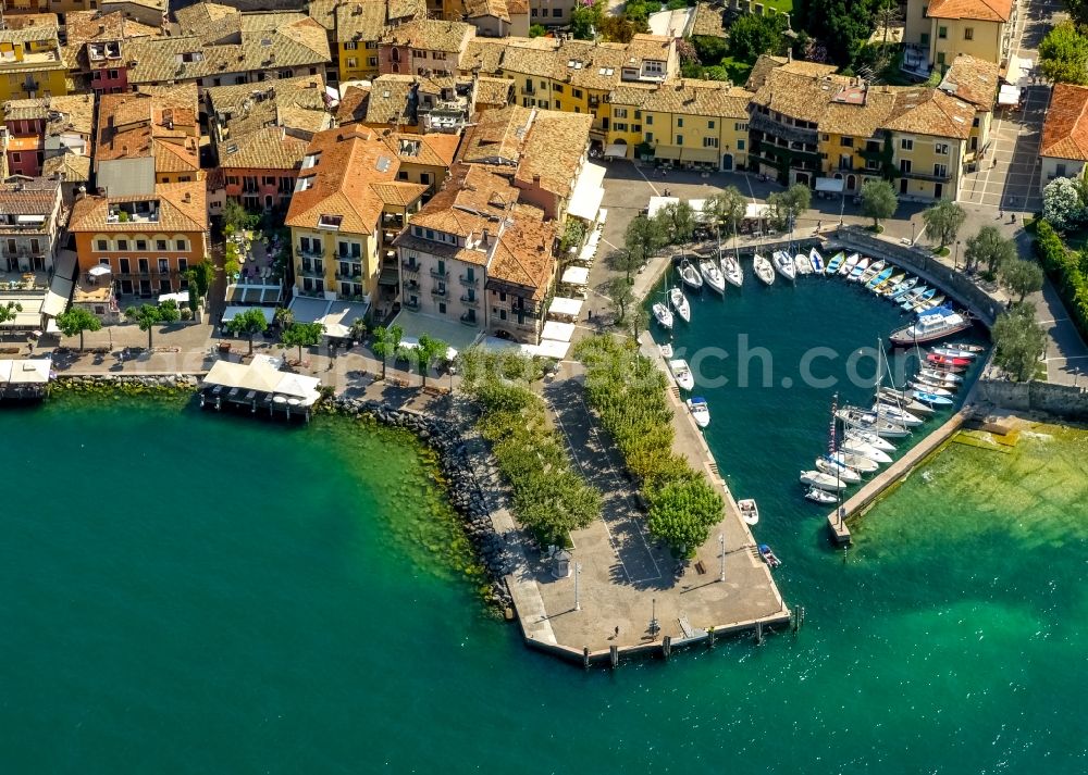 Torri del Benaco from the bird's eye view: Port facilities Porticciolo of Torri del Benaco in Veneto, Italy. In the picture as well as the museum of Castello Scaligero