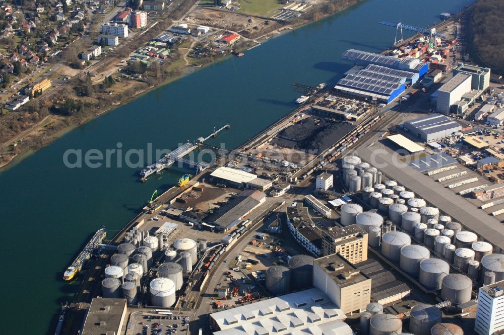 Birsfelden from the bird's eye view: Port facilities, terminals and tank farms with warehouses and freight forwarding and logistics companies in Birsfelden in Switzerland