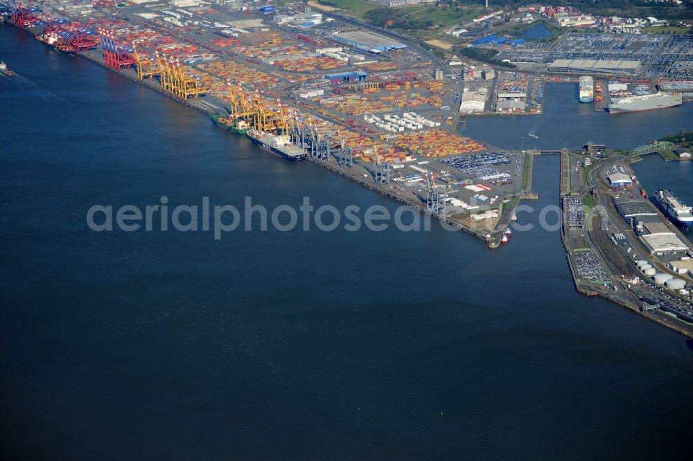 Bremerhaven from the bird's eye view: Docks and terminals with warehouses and freight forwarding and logistics companies by the mouth of the Weser in Bremerhaven in the state Bremen