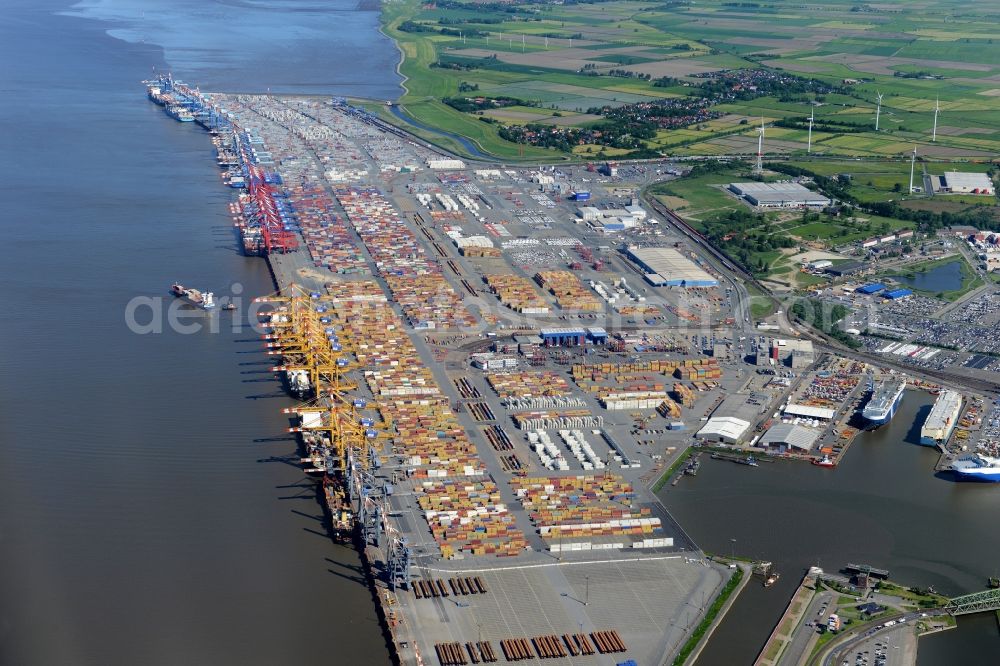 Aerial photograph Bremerhaven - Docks and terminals with warehouses and freight forwarding and logistics companies in the international port by the mouth of the Weser in Bremerhaven in the state Bremen